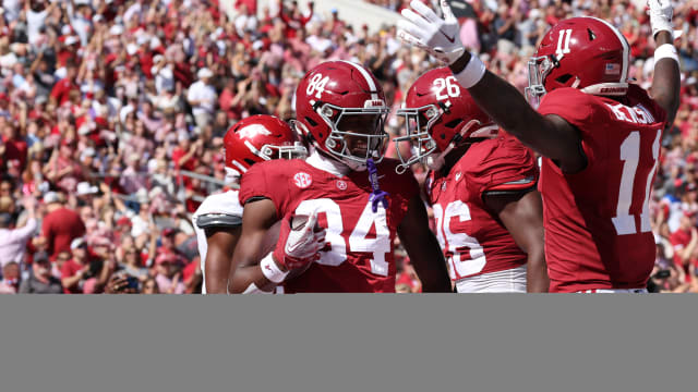 Amari Niblack, Malik Benson celebrate touchdown against Arkansas